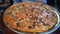 Extra large pizza with sausage and mushrooms