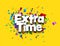 Extra time sign over colorful cut out foil ribbon confetti background