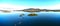 Extra wide aerial panorama of Church of St. Linhart in South Moravia on the island in stunning evening HDR