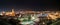 Extra wide panorama night view of the Alcazaba castle, Cathedral, and the the roman theatre. Citiscape of Malaga, Spain