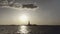 Extra wide shot of Statue of Liberty filmed in the sunset from the river in New York, United States of America