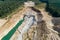 Extraction of minerals by the open method. Mining, extraction of rocks by an excavator. Aerial view