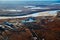 Extraction of natural gas. Mining. Industrial village in the tundra. View from above