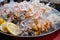 An extraordinary plate French oysters, shrimps, kebabs Mixed Cold Seafood with lemon, and Ice