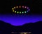 Extraterrestial UFO object over black mountains during the early evening