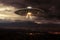 Extraterrestrial ship flying over earth during daytime