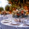 Extravagant event table at luxury wedding reception adorned beautifully