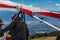 Extremal man with hang-glider preparing to fly