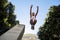 Extreme athlete jumping in the air in front of a building