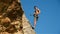 Extreme Climber Hanging On A Rope