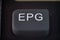 Extreme cloesup of a EPG button on a TV remote