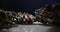 extreme close-up detailed closed oysters against a dark background against a white reflective surface