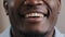 Extreme close up happy male smiling face african american young man positive male model ethnic guy smile toothy with