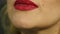 Extreme close up of lip. Woman pursing her lips in a seductive gesture. slow motion