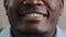 Extreme close-up male lower part of face smiling african american man guy customer announcer speaker seductive lips with