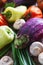 Extreme close-up of various vegetables covered by water drops.