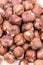 Extreme closeup macro bunch of hazelnuts background