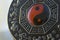 Extreme closeup macro photography of a Chinese Bagua object showing ying yang theory. Art and culture of China concept