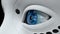 Extreme closeup to blue eye of female humanoid robot with shiny white plastic skin. 3D Illustration