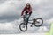 . Extreme cycling.Man jumping on a sports bike.A dangerous trick on a bicycle