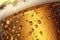 Extreme detail shot focused on glass. Detail of beer beverages surface