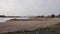 Extreme low water line in river Rhine DÃ¼sseldorf in extreme drought with no rainfall causes drying out riverbed