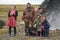 The extreme north, Yamal, the past of Nenets people, the dwelling of the peoples of the north, a family photo near the yurt in the