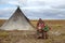 The extreme north, Yamal, the past of Nenets people, the dwelling of the peoples of the north, a family photo near the yurt in the
