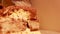 Extreme selective focus macro Close-Up Up View Of Tiramisu Dessert pastry cake against plain background and a used spoon taking a