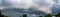 Extreme thunderstorm shelf cloud. Summer landscape of severe weather