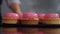 Extremely close up footage of delicious pink glazed dessert tartles. Culinary, desserts, pastry concept