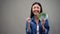 Extremely happy woman holding euros banknotes, good salary, employment concept