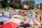 Extremely overcrowded Cronulla beach on Australia day. Umbrellas on the beach