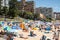 Extremely overcrowded Cronulla beach on Australia day. Umbrellas on the beach