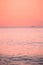 Extremely pink photo of a little island during the sunset in Tonga