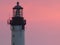 Extremity of a lighthouse in a pink sky to Biarritz in France