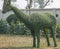 A eye catching green topiary of deer