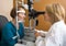 Eye Doctor Examining Woman\'s Vision