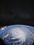 Eye of the hurricane. Typhoon over the planet Earth, view through the porthole of the space station. A category 5 super Typhoon