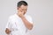 Eye irritation concept : Portrait of Asian man in posture of eye tired,  irritation or problem about his eye. Studio shot isolated