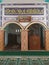 Eye level view of the mihrab or a special room that juts forward, as a place for the imam to lead prayers in the mosque