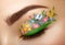 Eye makeup girl with a flowers
