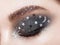 Eye makeup woman with decorative stars