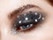 Eye makeup woman with decorative stars