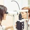 Eye ophthalmologist exam. Eyesight recovery. Astigmatism check concept. device