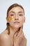 Eye patch. Woman with gold under eye pads on beauty face