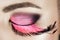 Eye with pink eyelashes