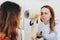 Eye test for visual acuity. The patient receives eye consultation.