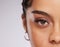 Eye, vision and beauty with contact lens and black woman, care for eyes and cosmetics with closeup on studio background