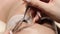 Eyelashes extensions. Fake eyelashes. Eyelash extension procedure.Close up portrait of woman eye with long eyelashes